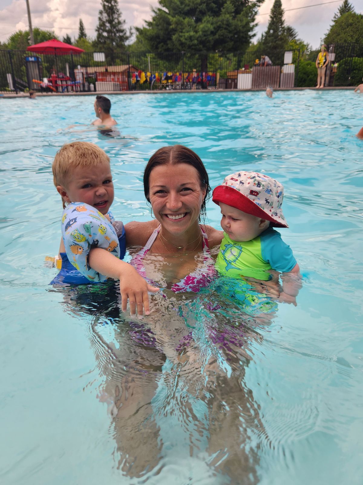 family swimming at grangeways rv campground